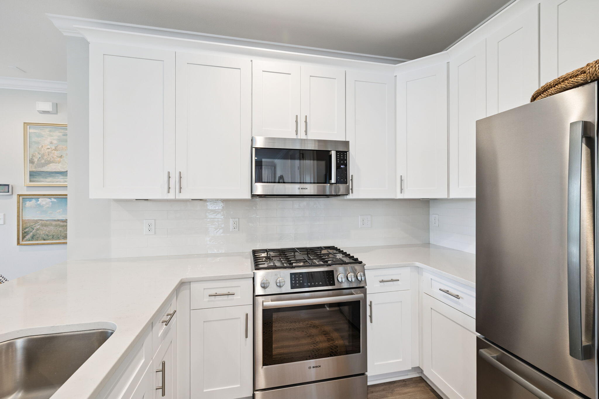 89 Cambium Ct Inlet Beach Inlet Beach, FL 32461 - Photo 12 of 32 a kitchen with stainless steel appliances white cabinets and a refrigerator