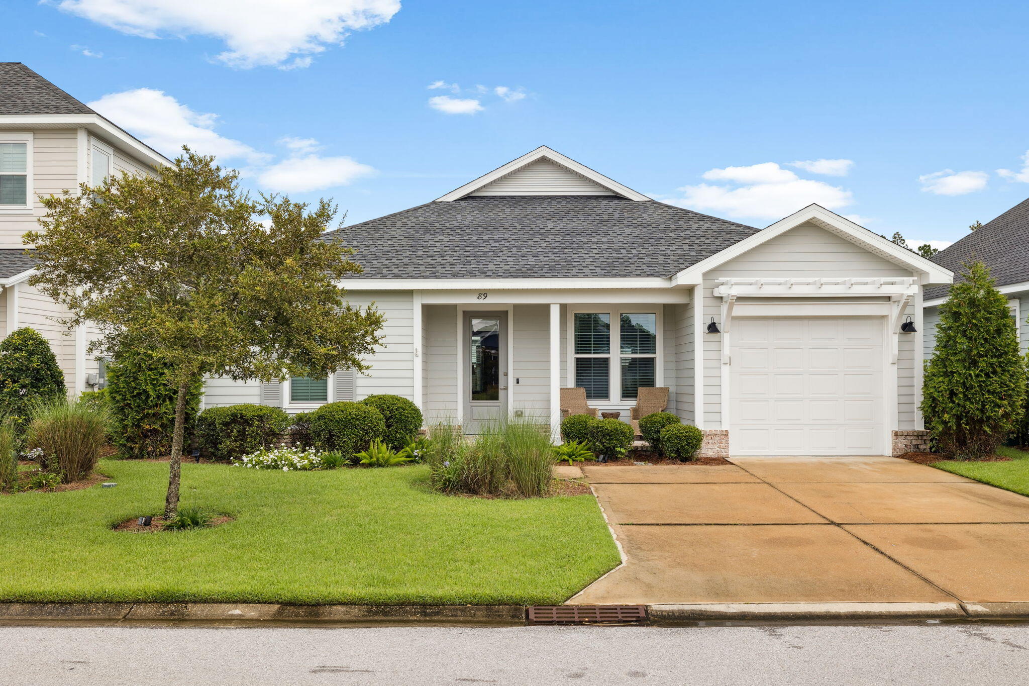 89 Cambium Ct Inlet Beach Inlet Beach, FL 32461 - Photo 2 of 32 a front view of a house with a yard