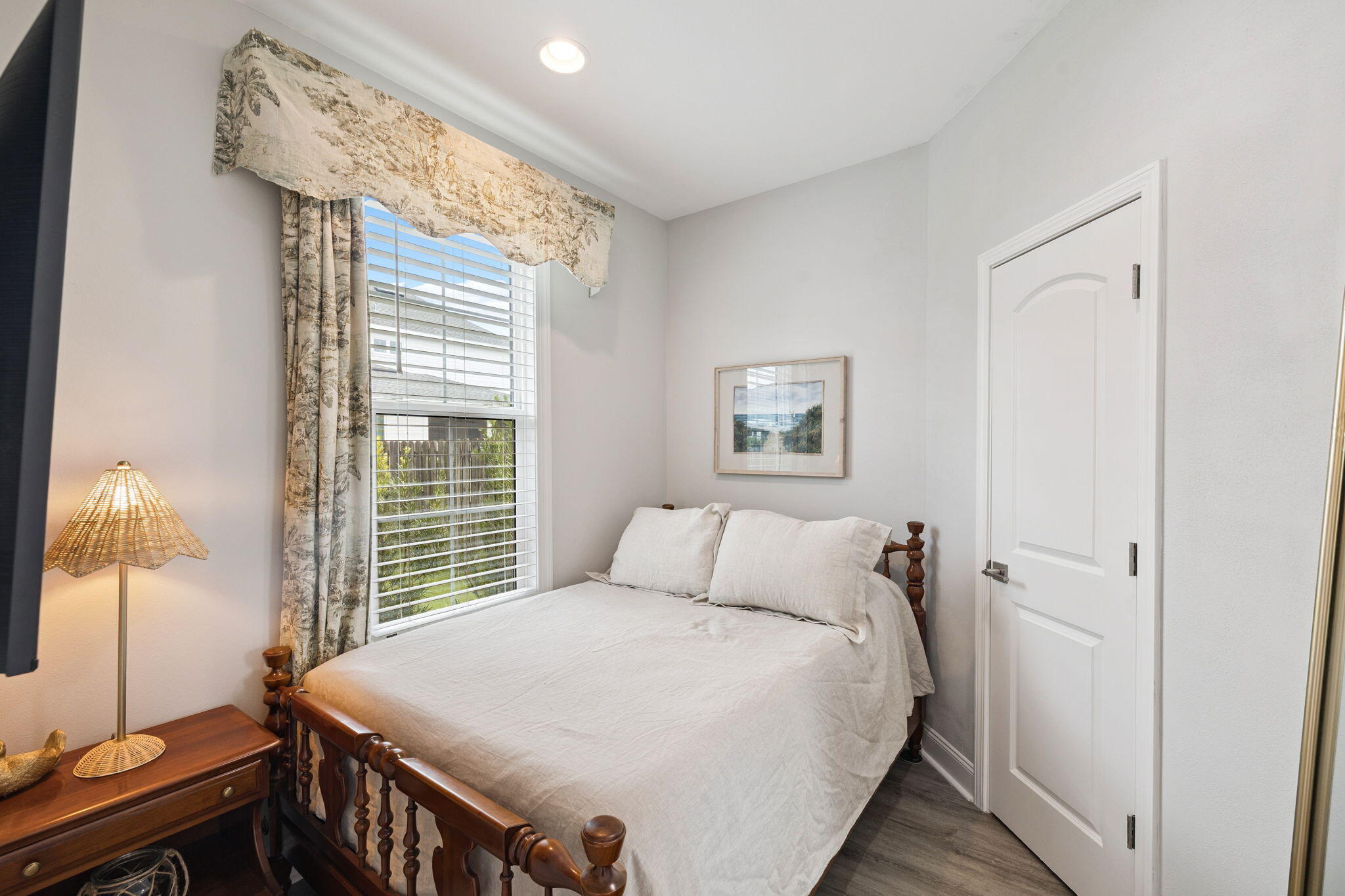 89 Cambium Ct Inlet Beach Inlet Beach, FL 32461 - Photo 25 of 32 a bedroom with a bed and a flat tv screen on the dresser