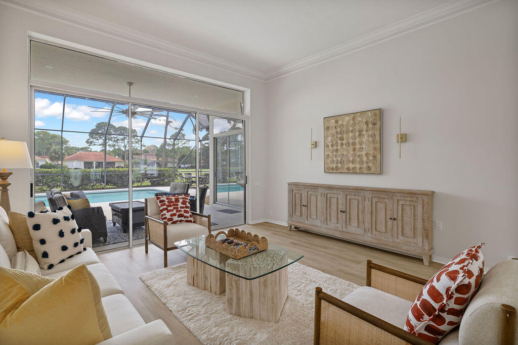 527 Indigo Loop Miramar Beach, FL 32550 - Photo 14 of 40 a bedroom with furniture and wooden floor