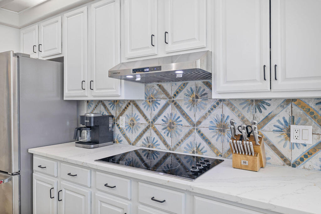 527 Indigo Loop Miramar Beach, FL 32550 - Photo 33 of 40 a kitchen with a sink and cabinets