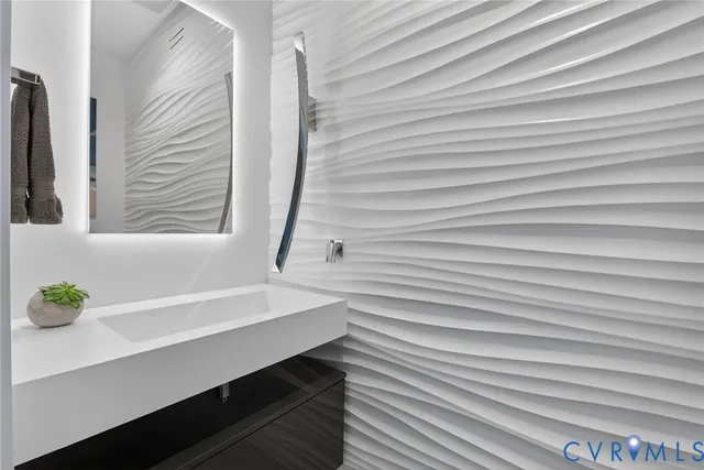 a bathroom with a sink and a bathtub