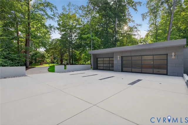 a view of backyard with garage