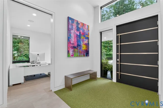 a view of room with window and cabinet