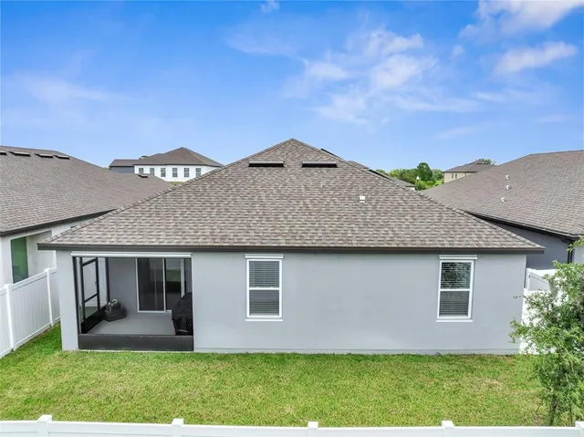 an aerial view of a house with a garden view
