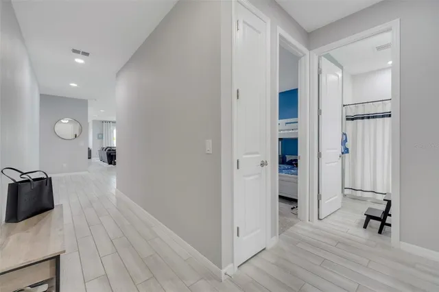 a view of a kitchen from the hallway