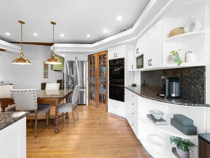 a lobby with furniture and flat screen tv