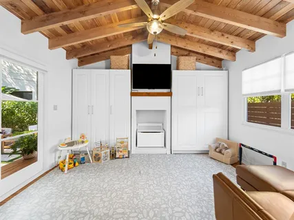 a room with furniture and a window