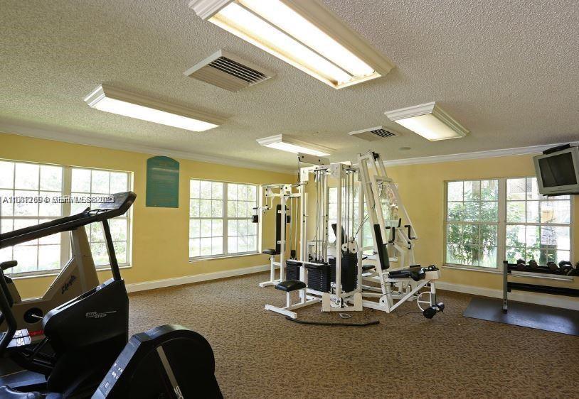 Palm Aire Pompano Beach, FL 33069 - Photo 11 of 11 a view of a room with gym equipment