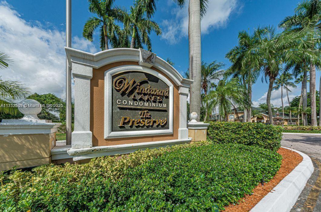 Palm Aire Pompano Beach, FL 33069 - Photo 2 of 11 a view of sign board with flower around