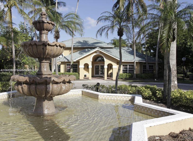 Palm Aire Pompano Beach, FL 33069 - Photo 5 of 11 a house view with a seating space