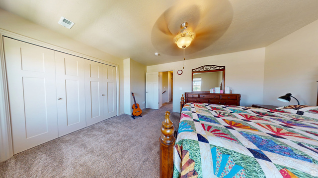 1674 Eastridge Road Price, UT 84501 - Photo 18 of 34 Spacious room featuring neutral carpeting and light-toned walls