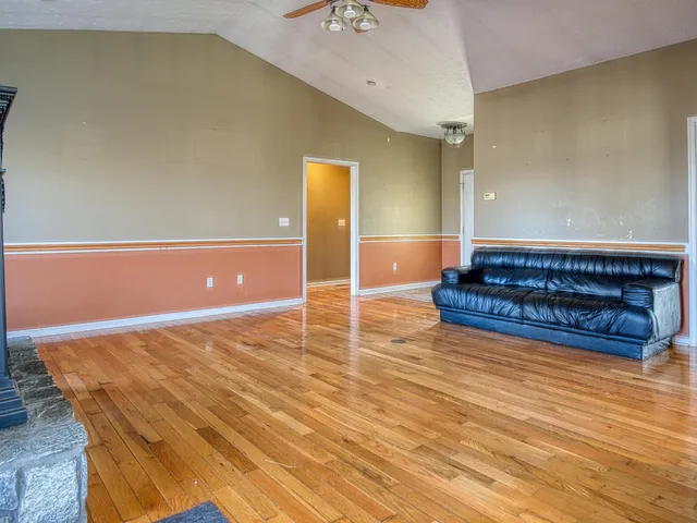 a view of a livingroom with furniture