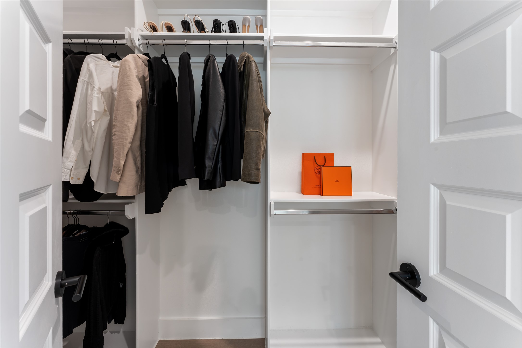 820 East 24th Street Houston, TX 77009 - Photo 18 of 34 a view of walk in closet with clothes and shoes