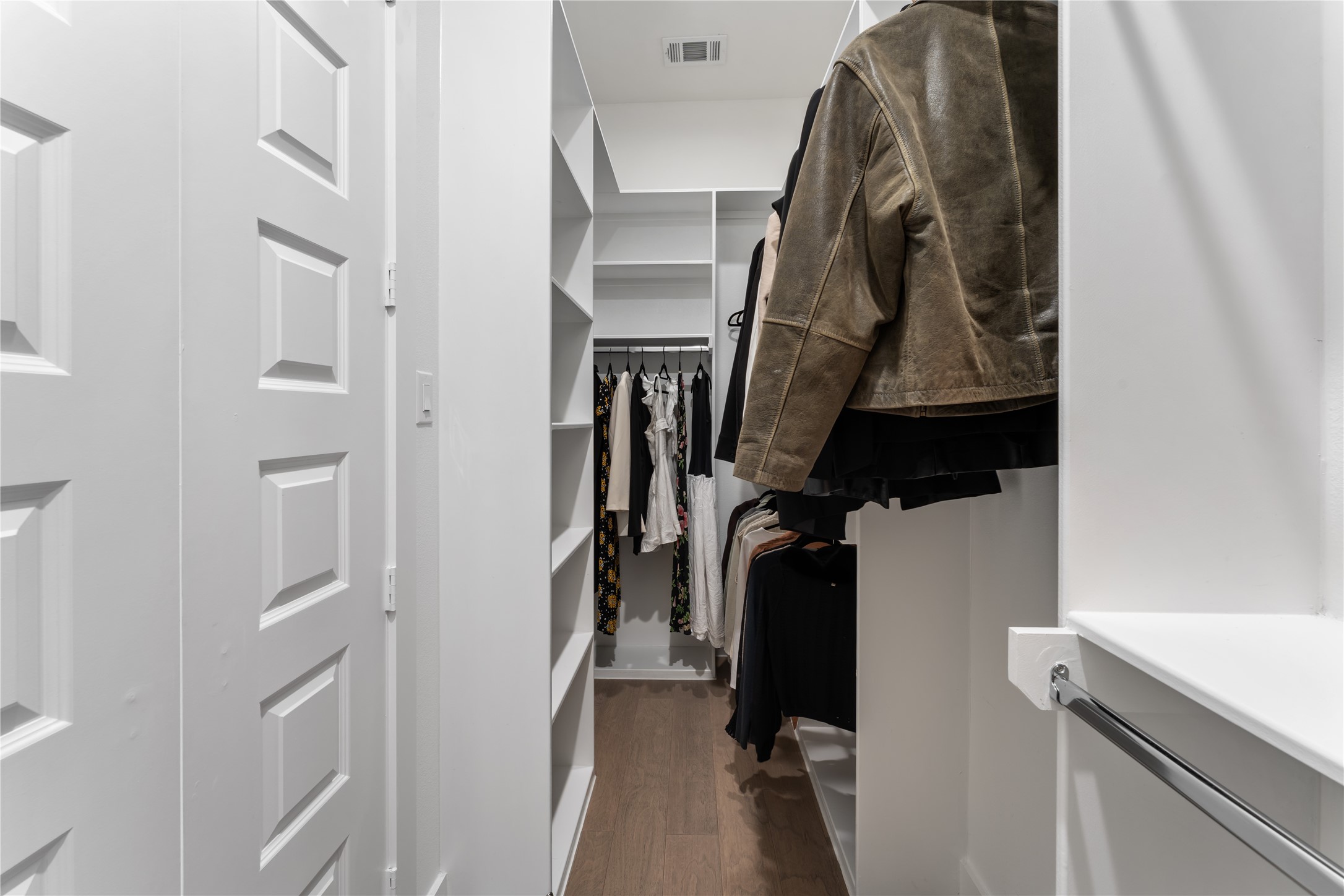 820 East 24th Street Houston, TX 77009 - Photo 19 of 34 a view of walk in closet with clothes and shoes