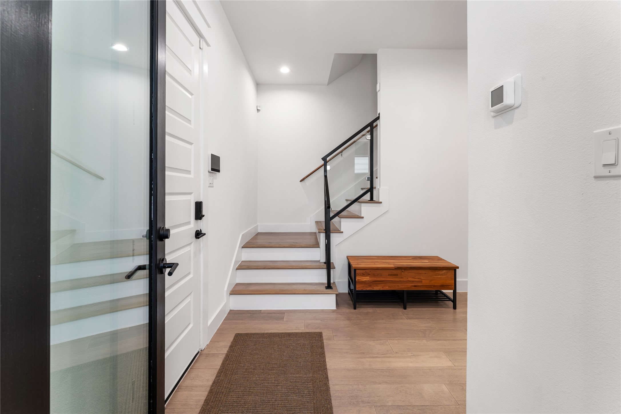 820 East 24th Street Houston, TX 77009 - Photo 33 of 34 Step inside to a bright, welcoming entry with clean lines and upscale finishes. The thoughtful floorplan begins to unfold, offering seamless flow into the main living areas. A perfect introduction to the home’s modern yet warm design aesthetic.
