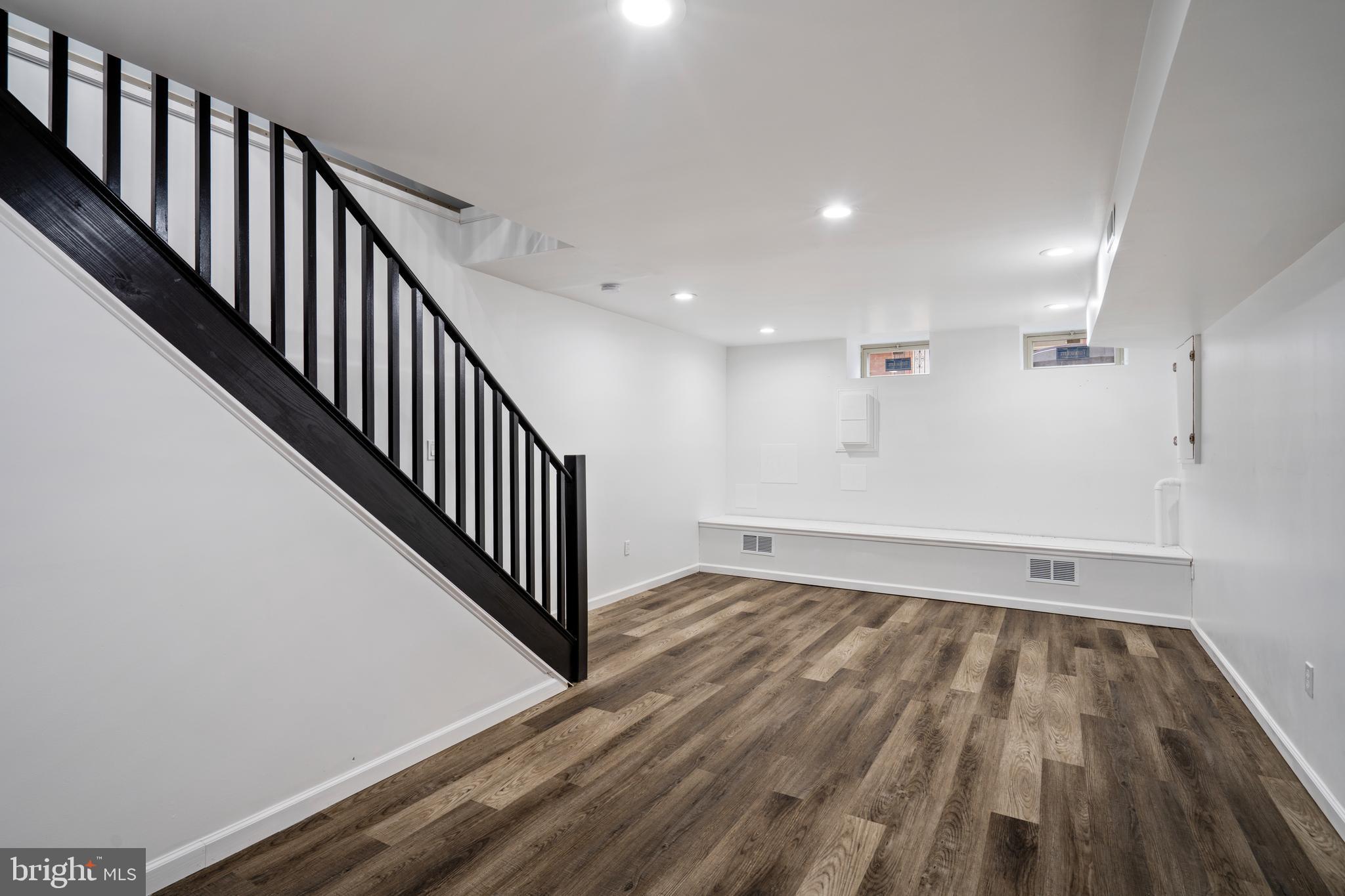 1605 Manton Street Philadelphia, PA 19146 - Photo 18 of 21 a view of a hallway with wooden floor