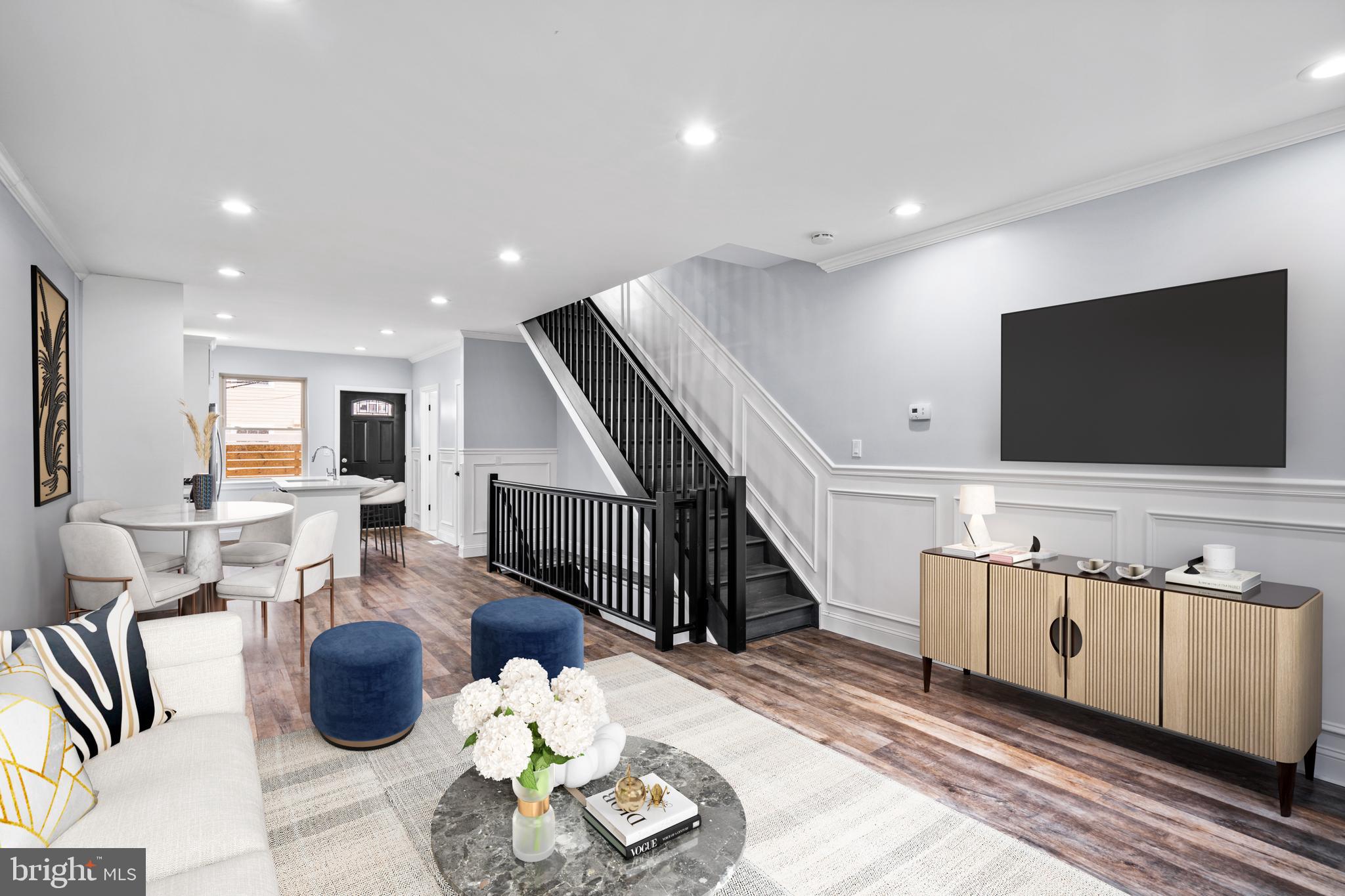 1605 Manton Street Philadelphia, PA 19146 - Photo 2 of 21 a living room with furniture and a flat screen tv
