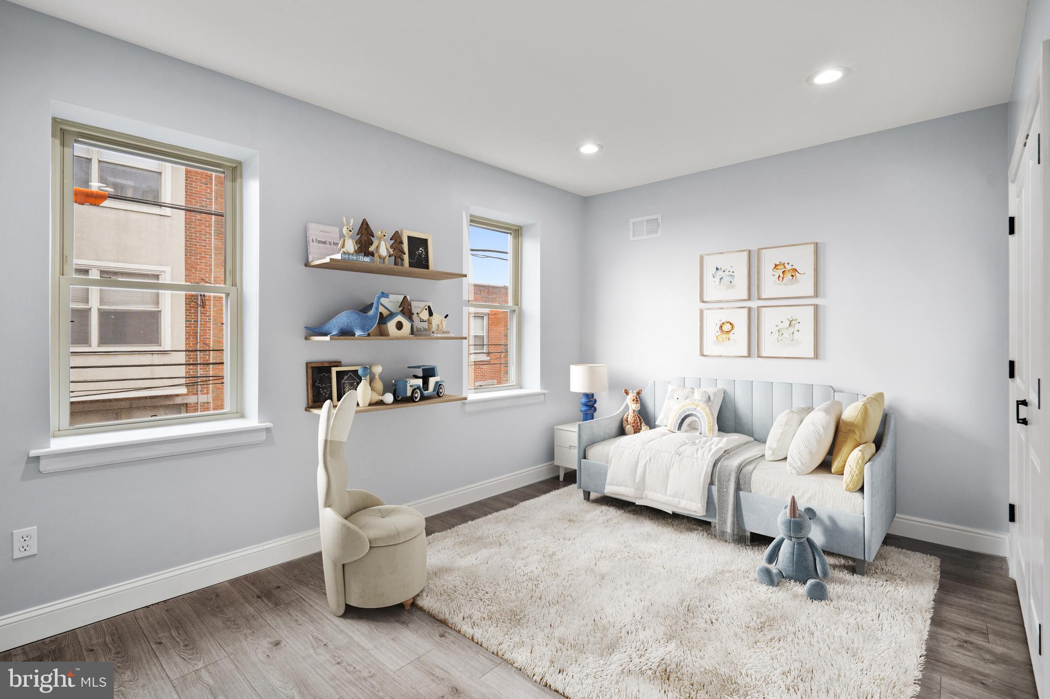 1605 Manton Street Philadelphia, PA 19146 - Photo 6 of 21 a bedroom with furniture and a window