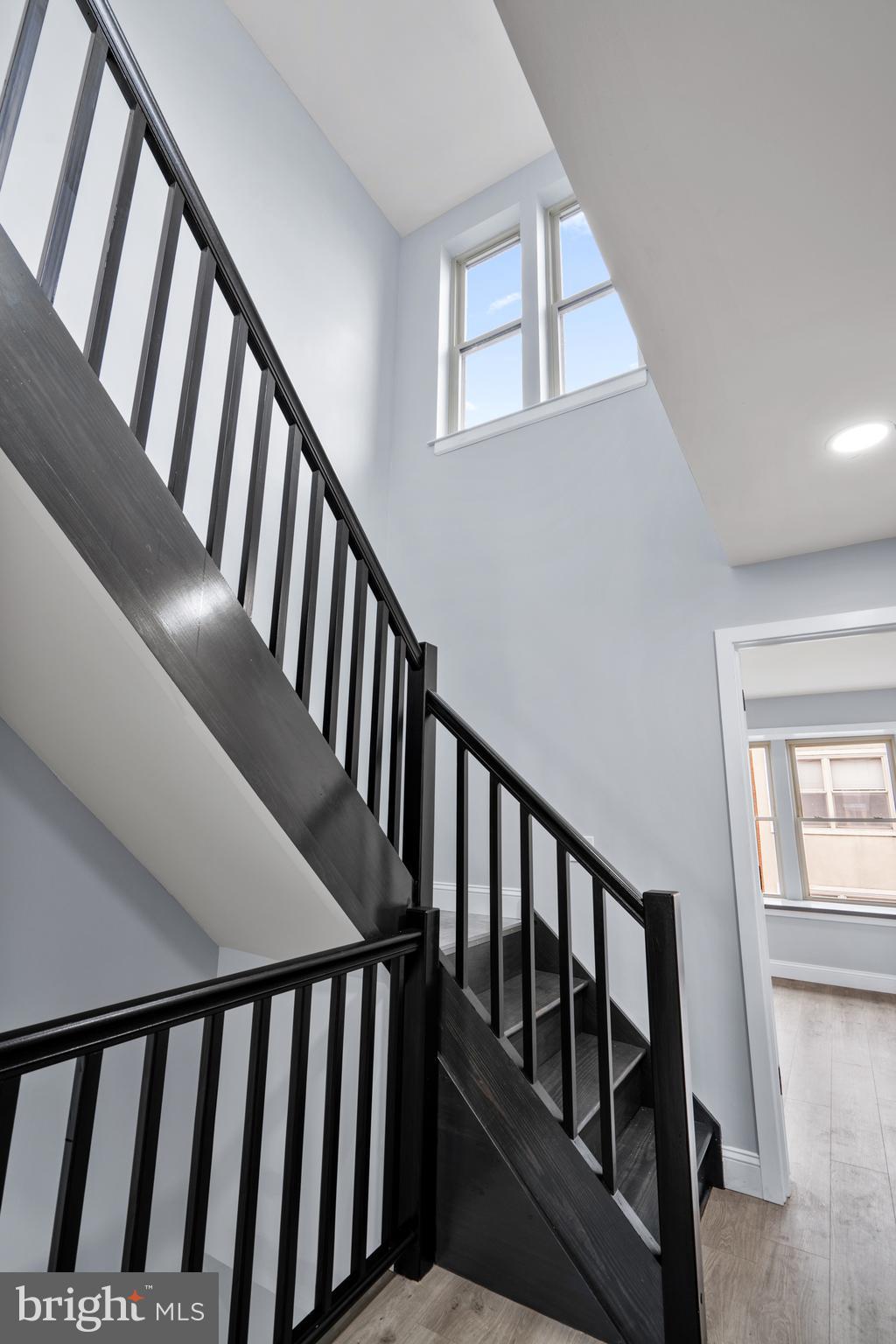 1605 Manton Street Philadelphia, PA 19146 - Photo 9 of 21 a view of staircase with lots of windows