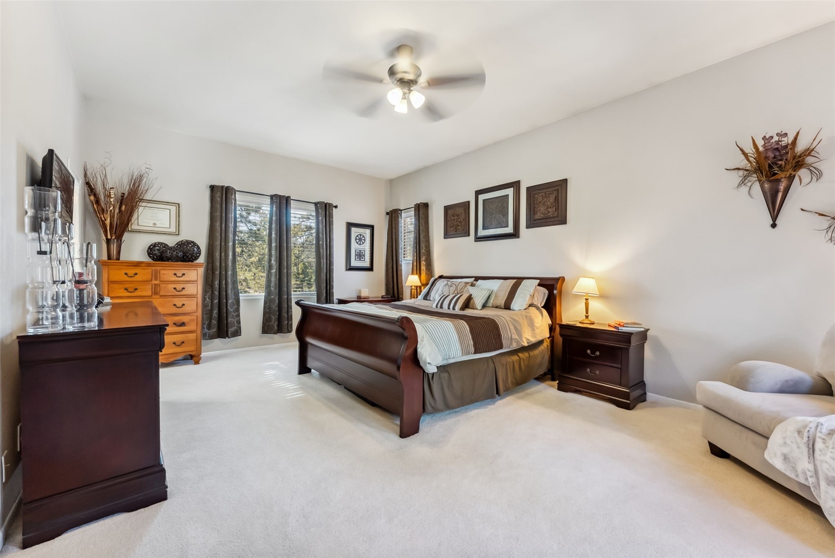 109 Old Corral Road Bailey, CO 80421 - Photo 32 of 50 Bedroom with carpet floors, ceiling fan, and baseboards