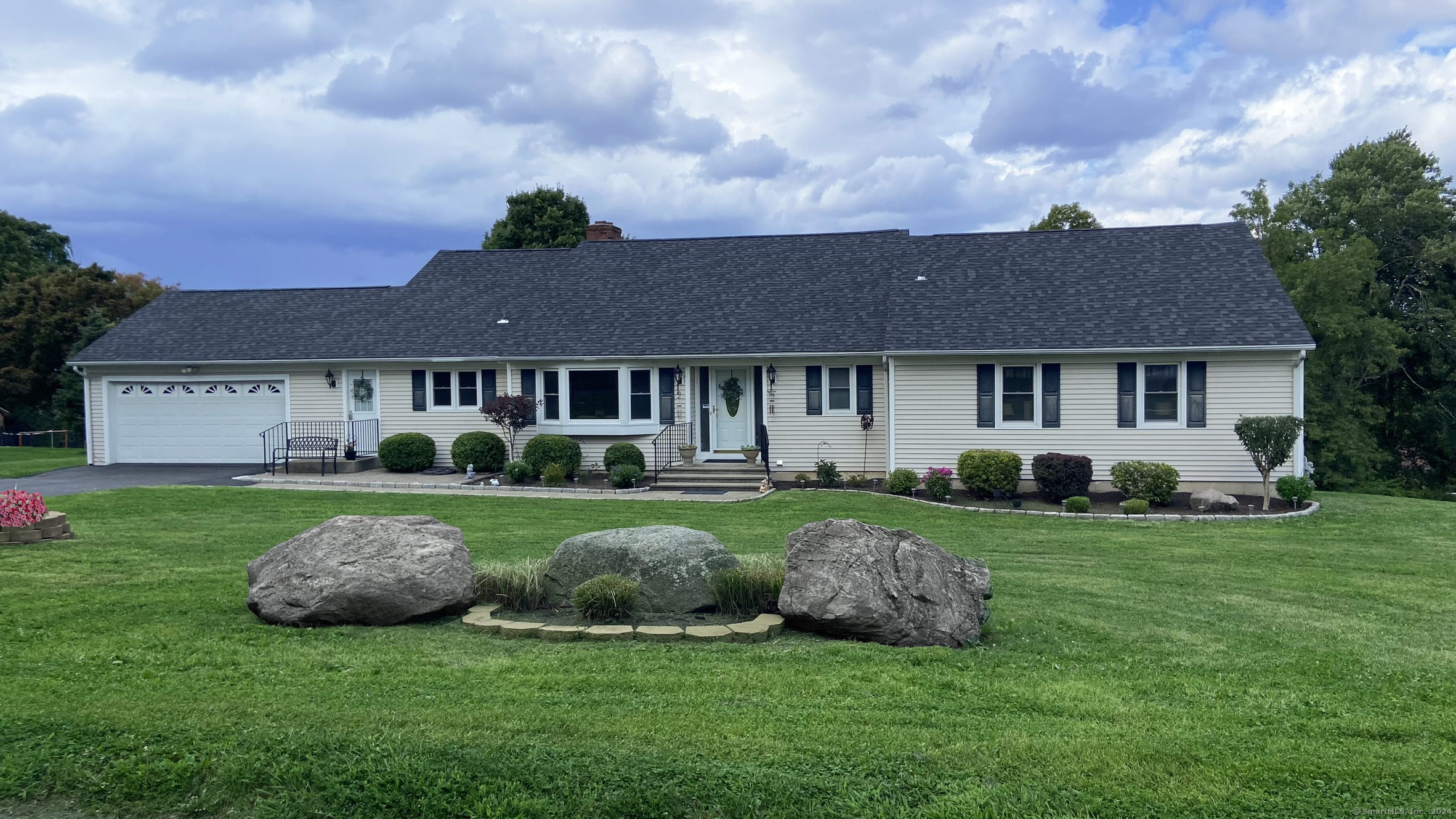 5 Topfield Road Danbury, CT 06811 - Photo 1 of 1 a view of a house with a big yard and large trees