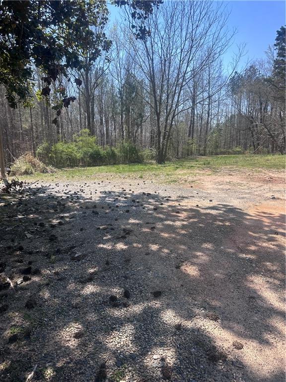 0 Elmo Road Cumming, GA 30028 - Photo 3 of 9 a view of a yard with a tree