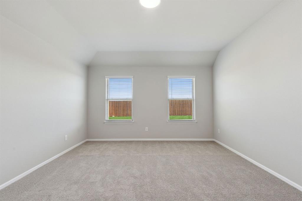 506 River Rdg Drive McKinney, TX 75071 - Photo 18 of 35 an empty room with a window