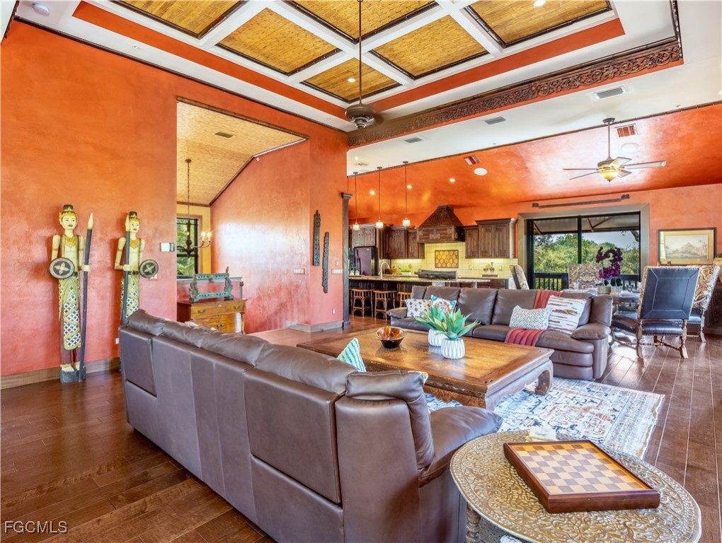 1000 Cayo Costa Boca Grande, FL 33921 - Photo 26 of 47 a view of a living room with furniture and a floor to ceiling window