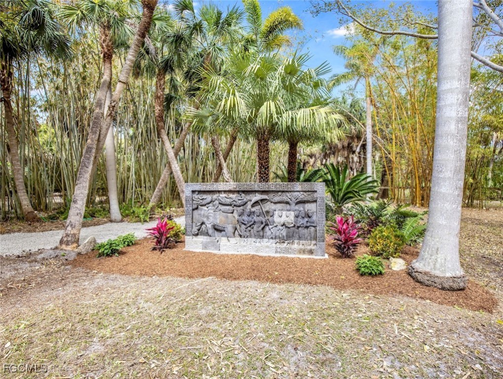1000 Cayo Costa Boca Grande, FL 33921 - Photo 38 of 47 a front view of a house with a yard and fountain