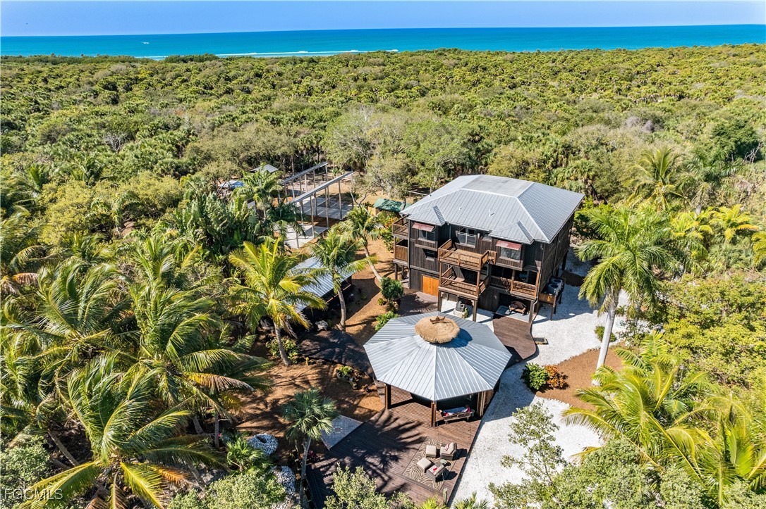 1000 Cayo Costa Boca Grande, FL 33921 - Photo 39 of 47 a view of a chairs and table in the patio