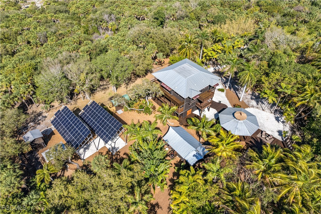 1000 Cayo Costa Boca Grande, FL 33921 - Photo 5 of 47 an aerial view of a house with swimming pool and sitting area