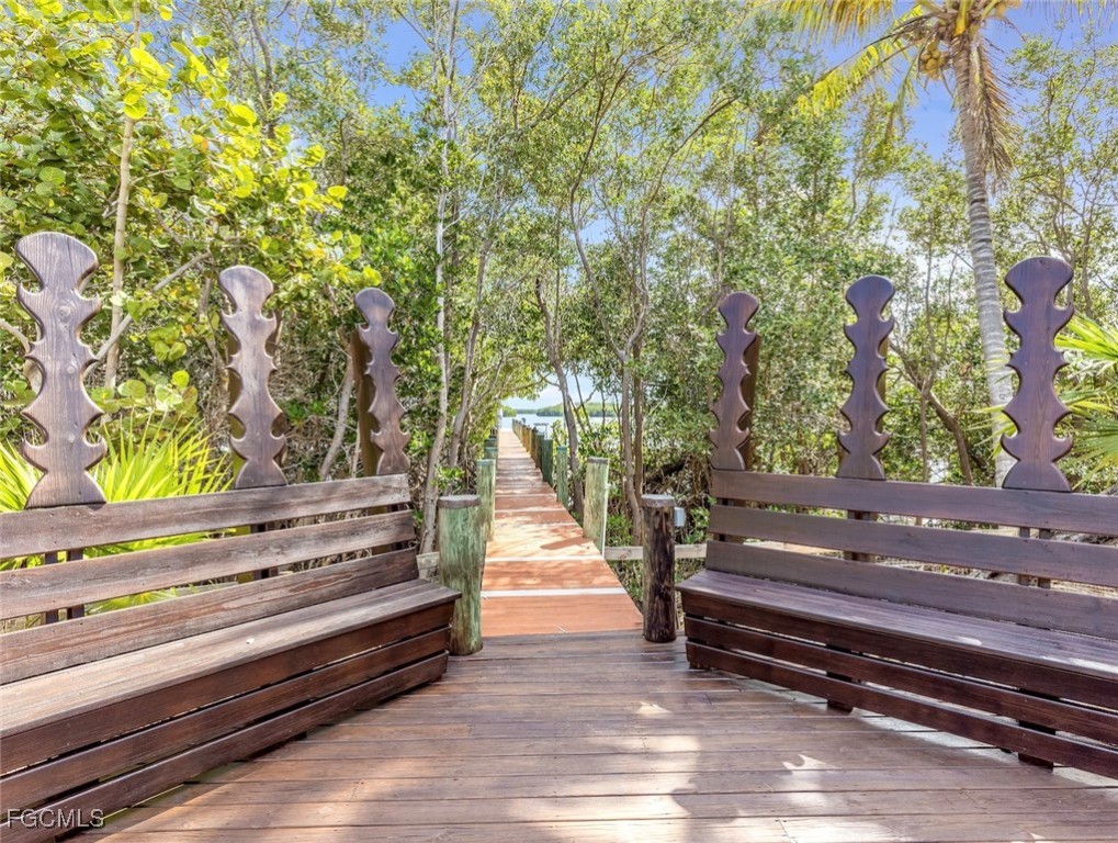 1000 Cayo Costa Boca Grande, FL 33921 - Photo 10 of 47 a sitting area with wooden floor and trees