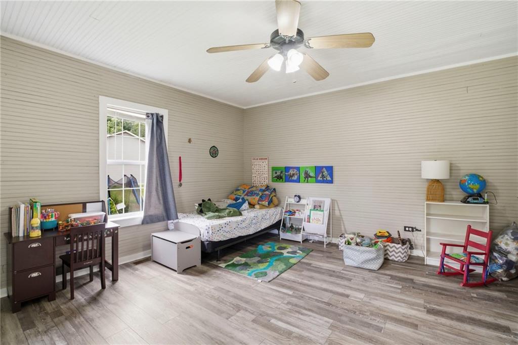 400 Sam Love Road Rocky Face, GA 30740 - Photo 27 of 29 a living room with furniture and a wooden floor