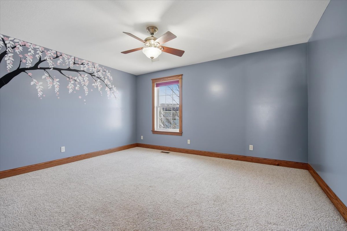 1813 Partridge Point Normal, IL 61761 - Photo 17 of 37 an empty room with windows and fan