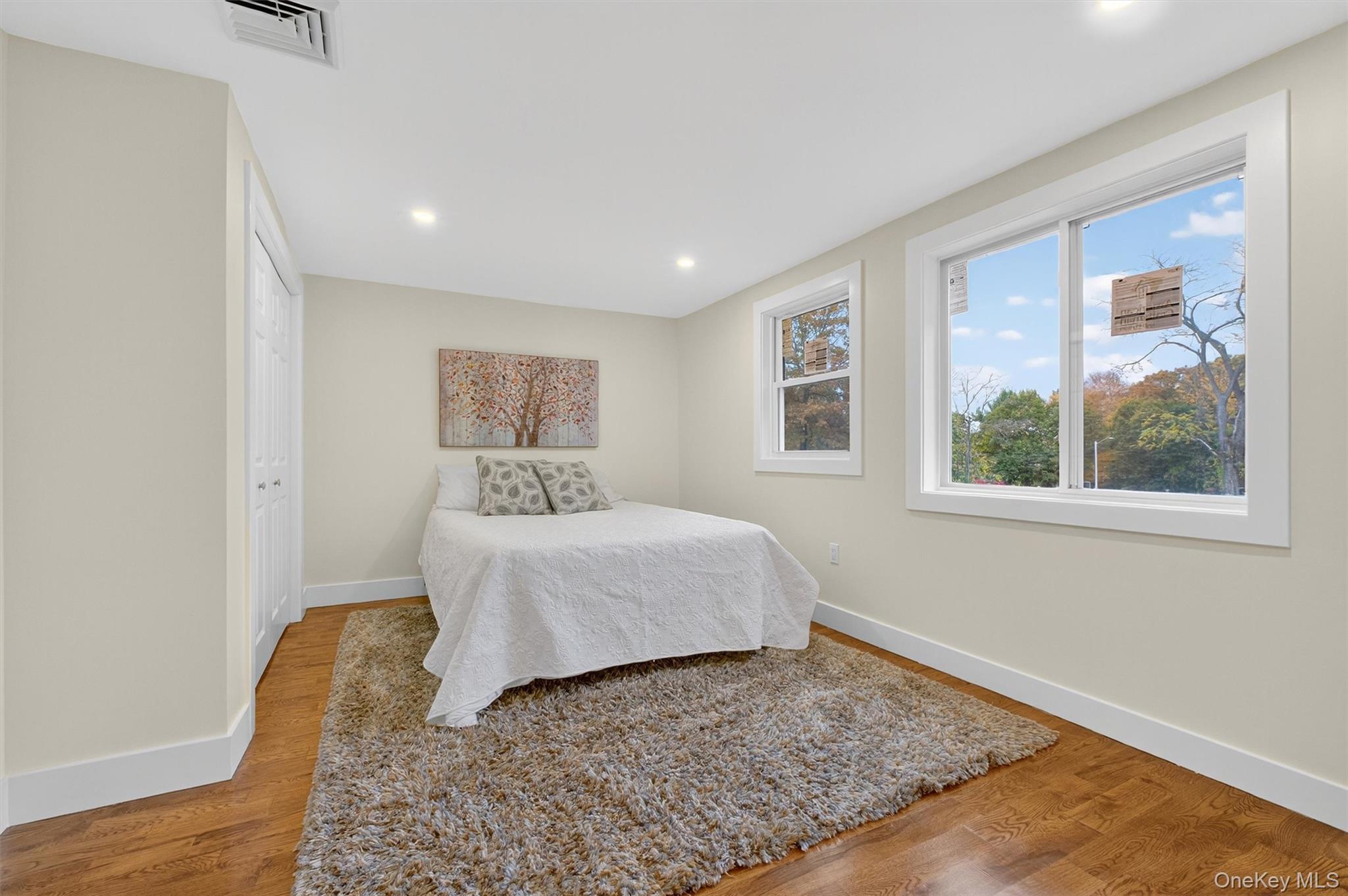 86 Vassar Road Poughkeepsie, NY 12603 - Photo 23 of 32 a bedroom with a bed and a window