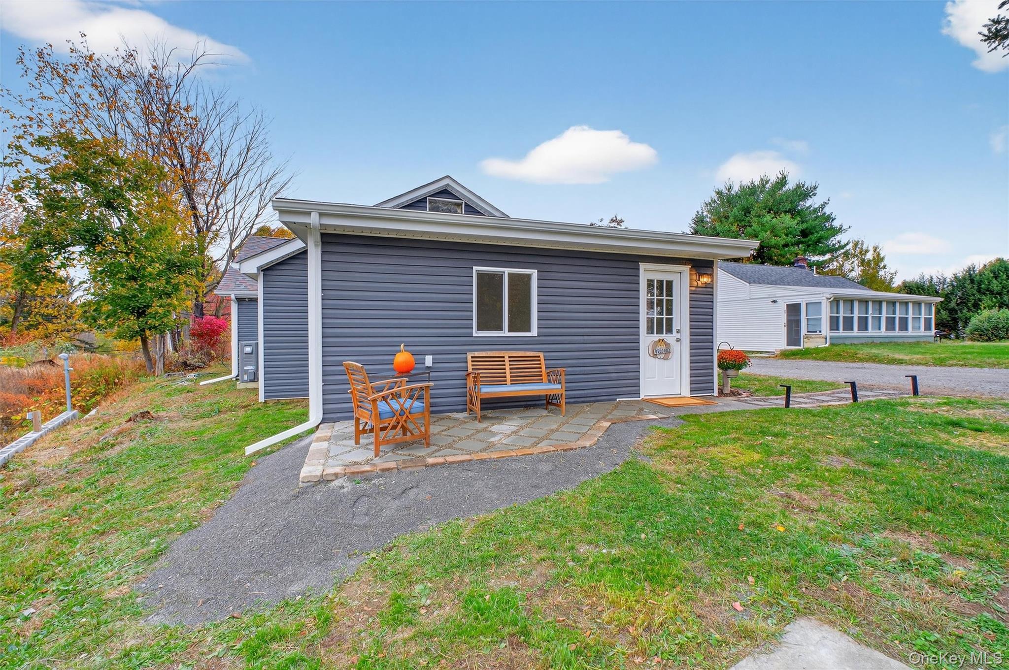 86 Vassar Road Poughkeepsie, NY 12603 - Photo 28 of 32 a view of a house with backyard and porch