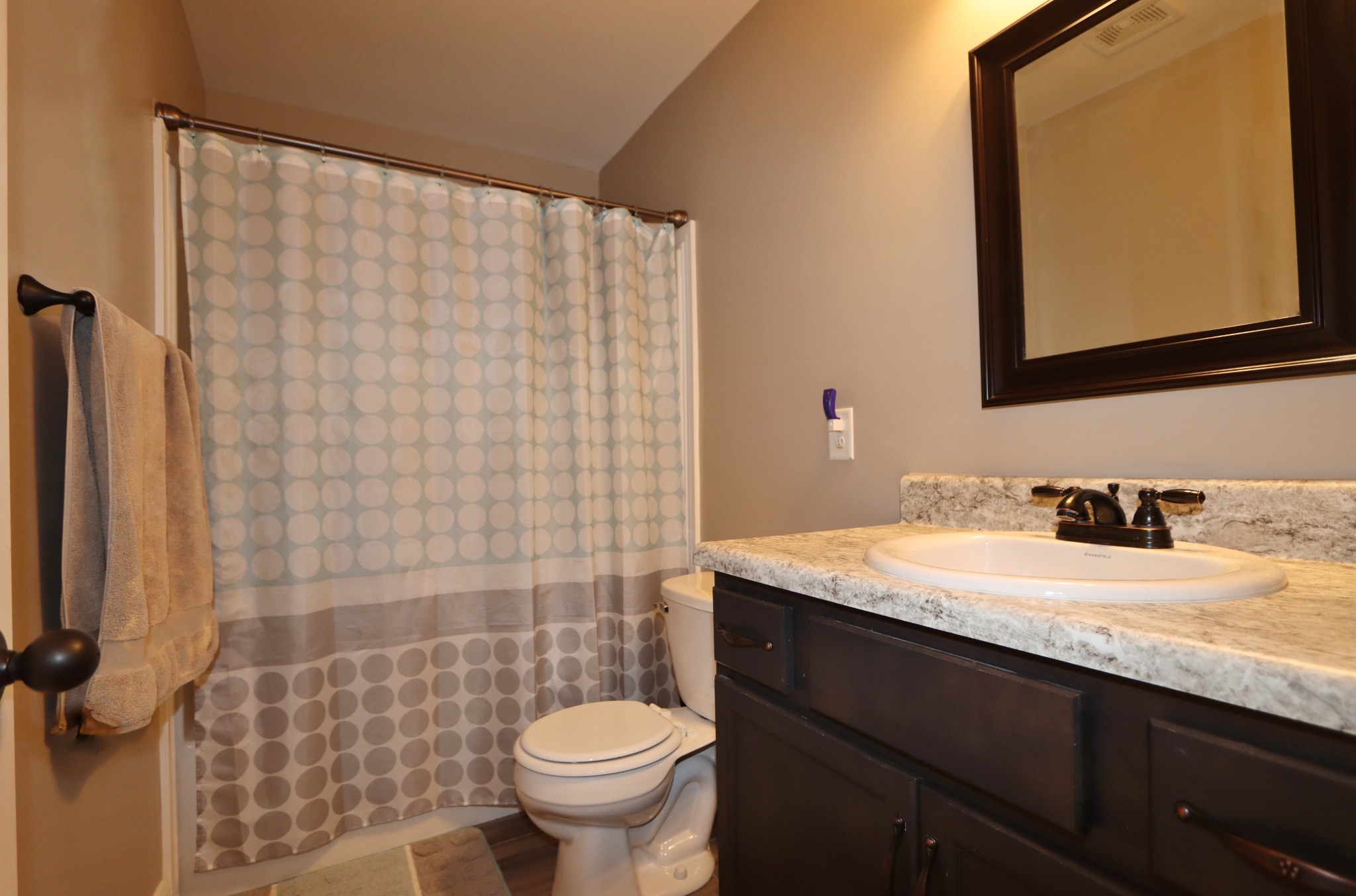 118 Ambridge Street Oak Grove, KY 42262 - Photo 13 of 14 a bathroom with a granite countertop sink toilet and mirror
