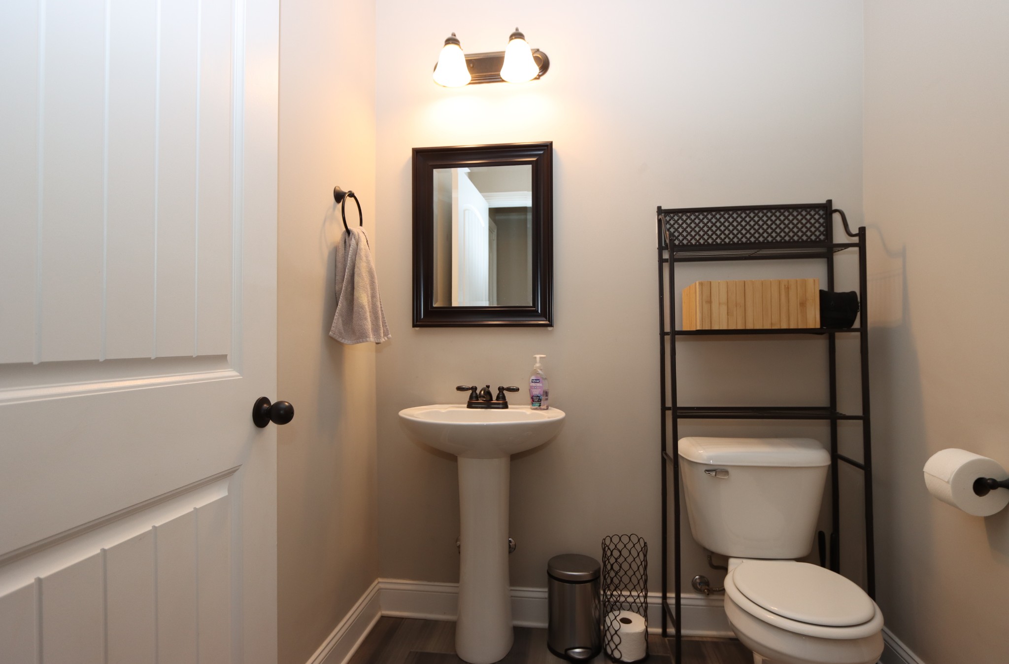 118 Ambridge Street Oak Grove, KY 42262 - Photo 7 of 14 a bathroom with a toilet a sink and mirror