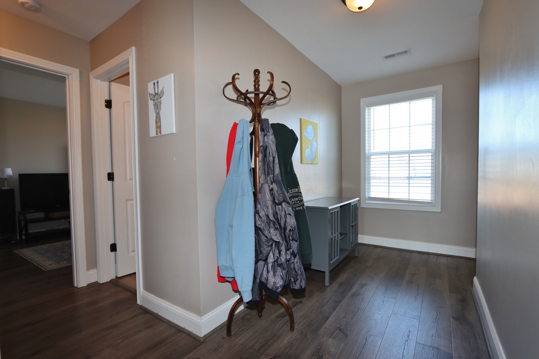 118 Ambridge Street Oak Grove, KY 42262 - Photo 8 of 14 a view of a room with a window and wooden floor