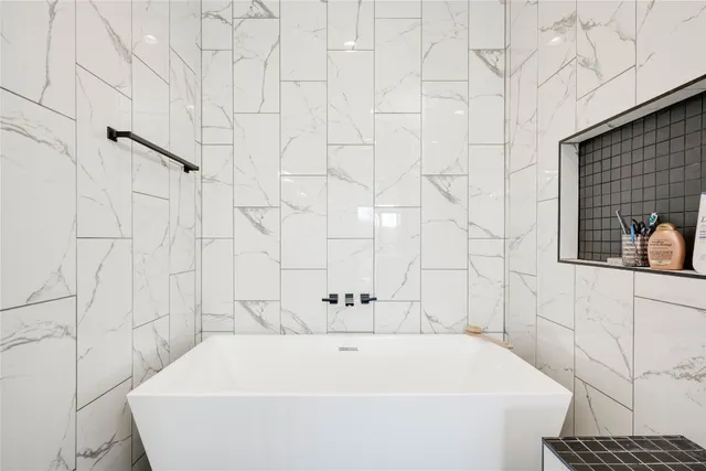 a bathroom with a bathtub