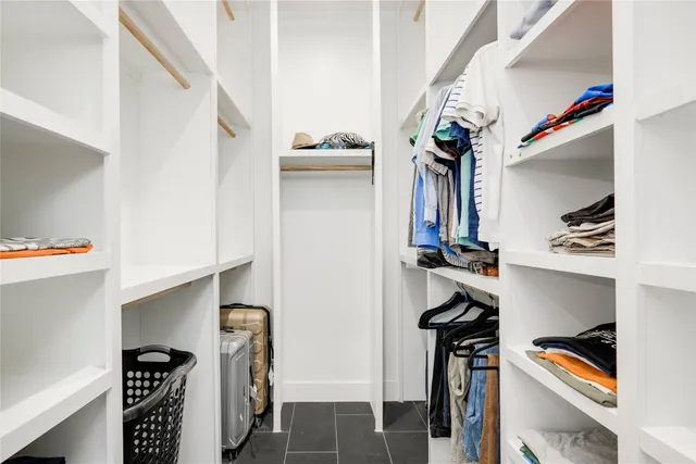 a room with a bed and a window