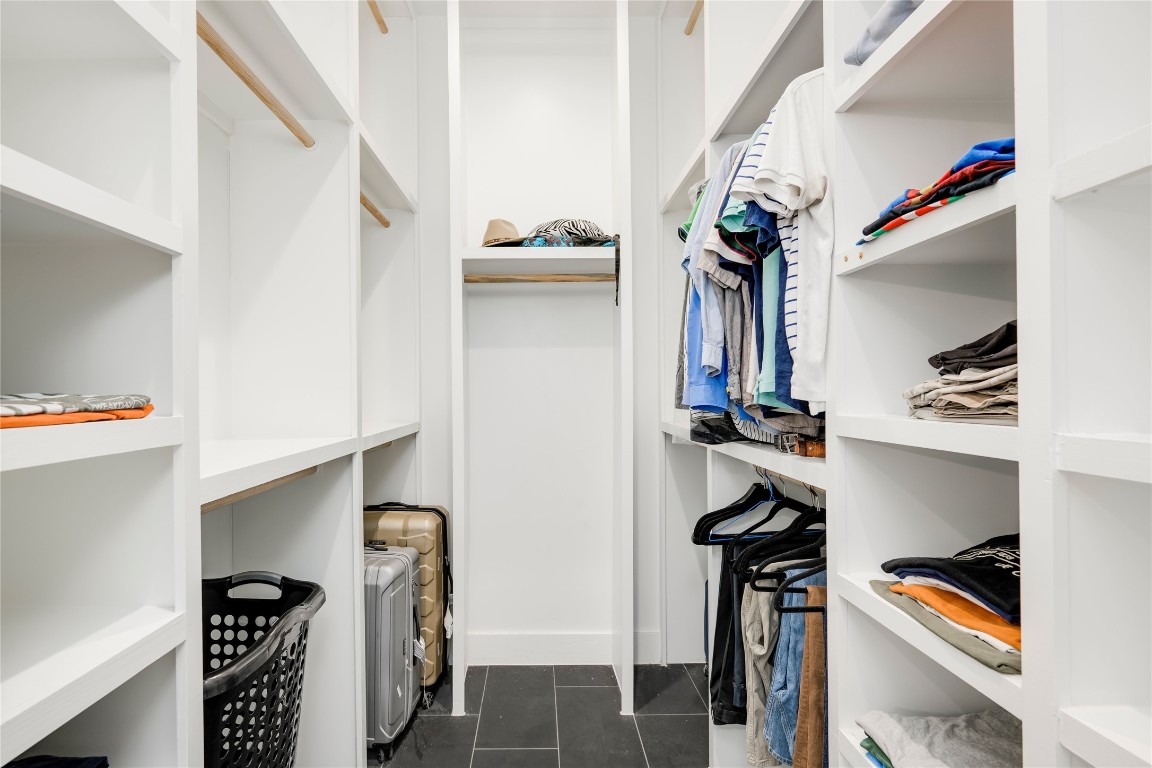 13209 Mansfield Drive Austin, TX 78732 - Photo 13 of 27 Spacious closet with dark tile patterned flooring