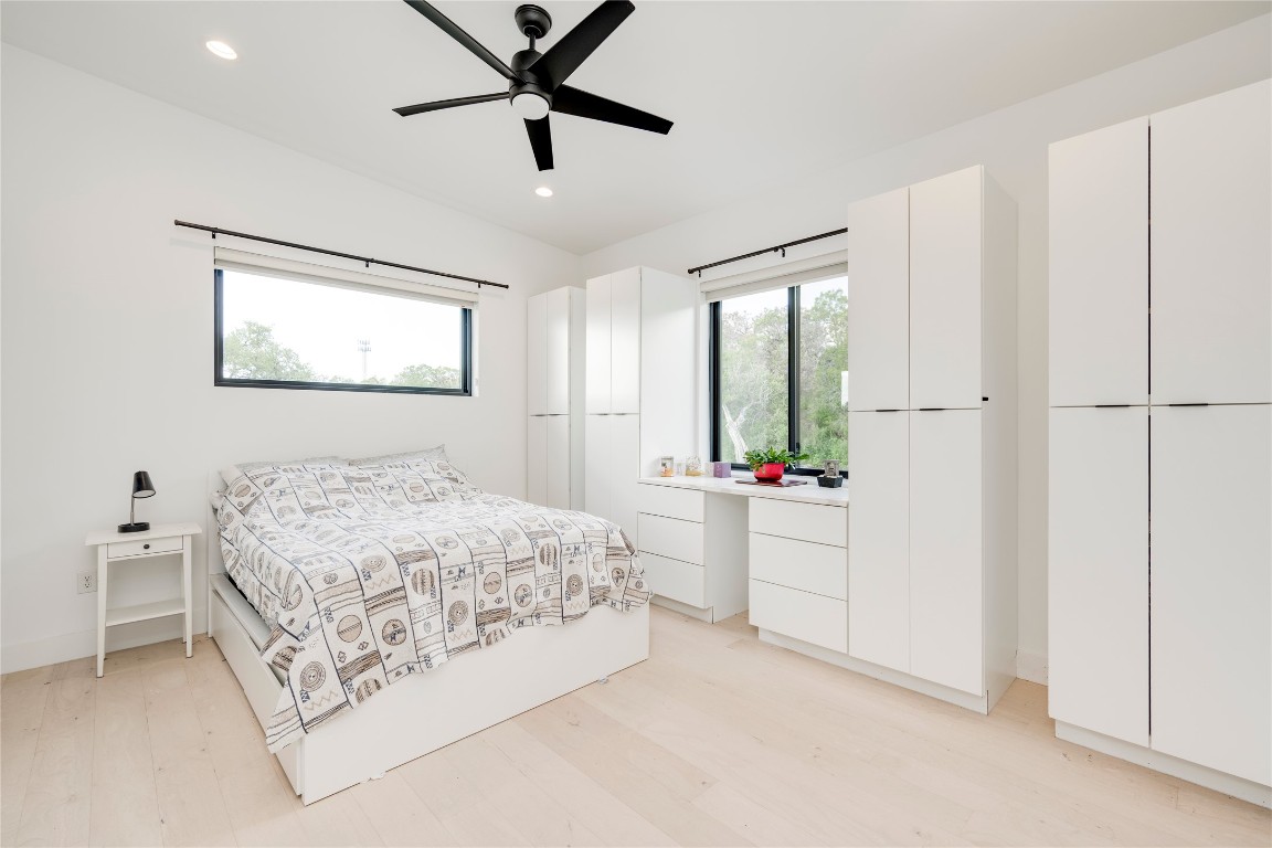 13209 Mansfield Drive Austin, TX 78732 - Photo 14 of 27 a room with a bed and a window