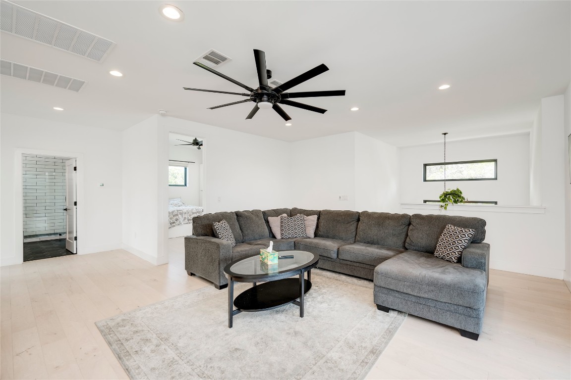 13209 Mansfield Drive Austin, TX 78732 - Photo 17 of 27 a living room with furniture and a rug