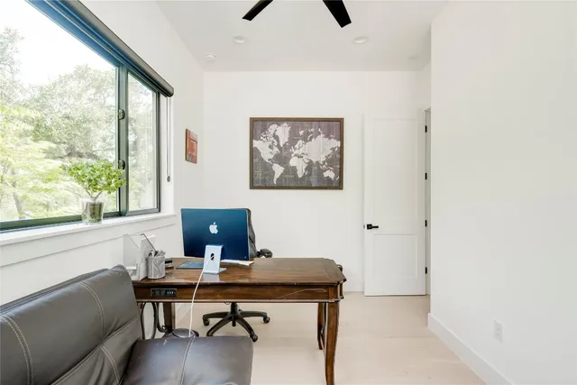 a spacious bathroom with a double vanity sink and shower