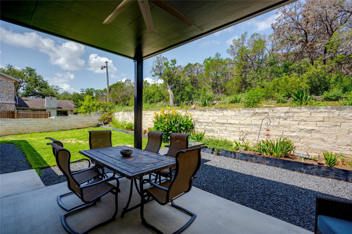 13209 Mansfield Drive Austin, TX 78732 - Photo 25 of 27 View of patio featuring outdoor dining space