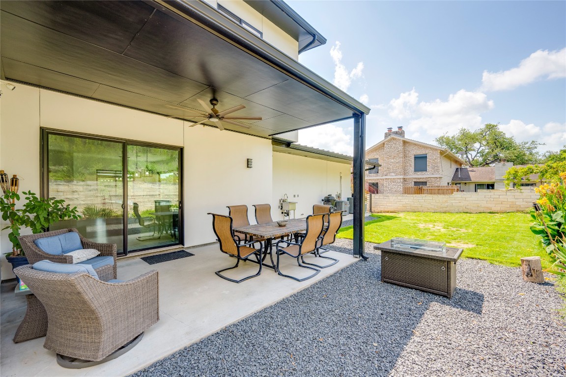13209 Mansfield Drive Austin, TX 78732 - Photo 27 of 27 View of patio featuring a ceiling fan and outdoor dining space