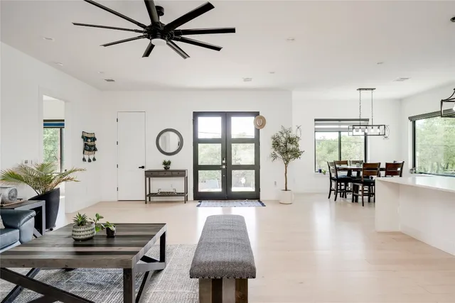 a living room with furniture and a table