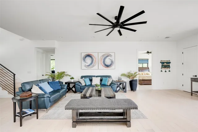 a living room with furniture and a table